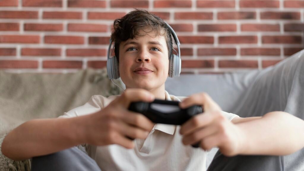 A boy playing with xbox controller